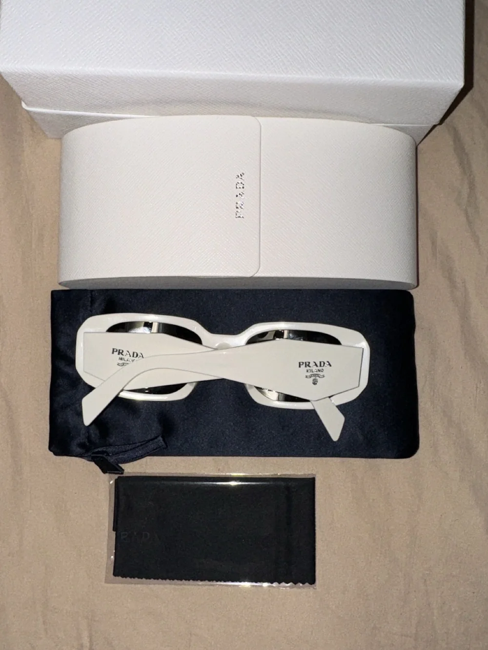 Prada Ivory Rectangular Sunglasses with Dark Lenses